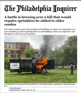 a picture of the front page of the Philadelphia Inquirer that shows an article about fire sprinklers